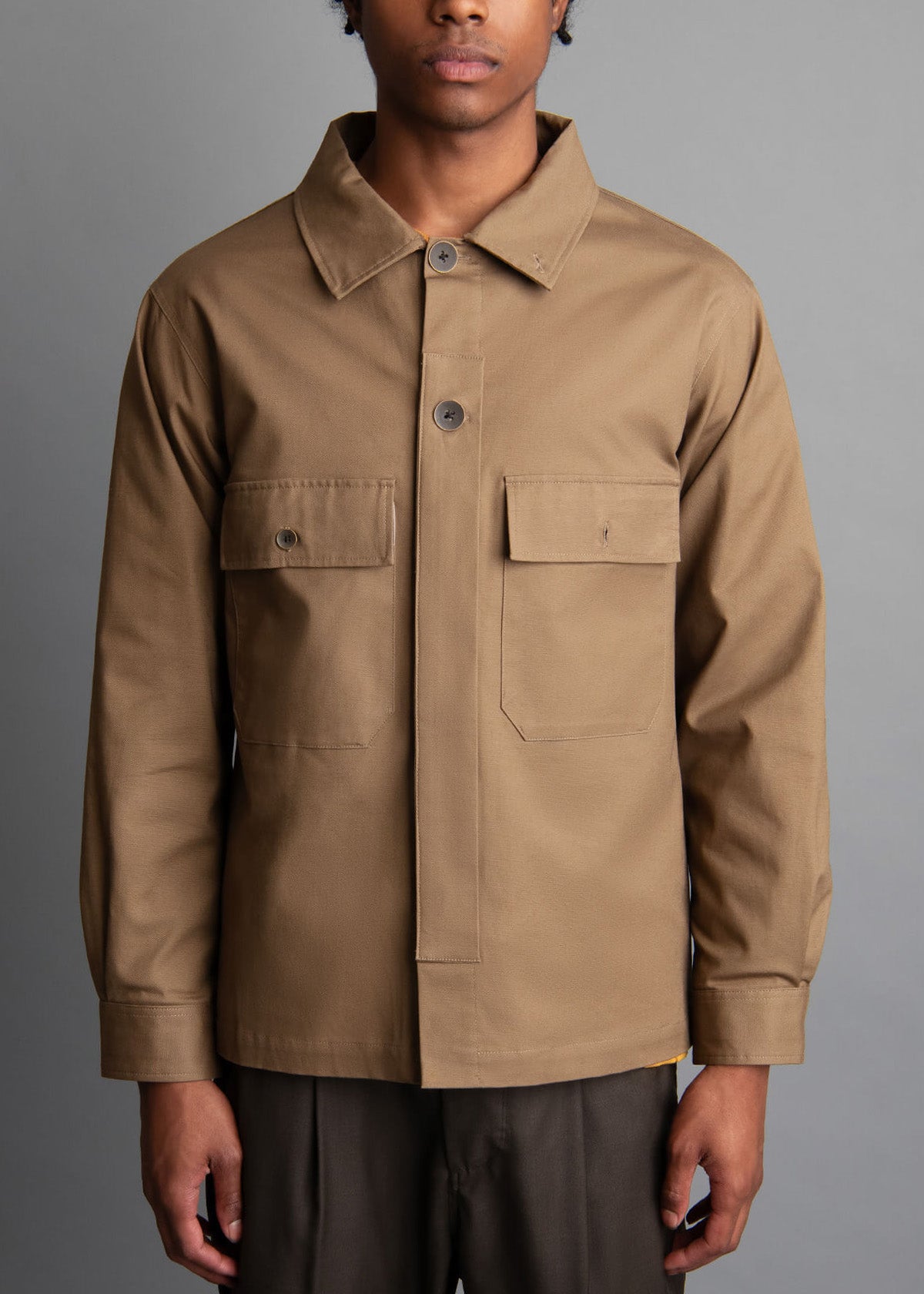 tan mens jacket with two breast pockets